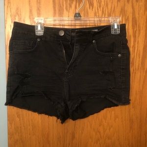 Black denim shorts with rips